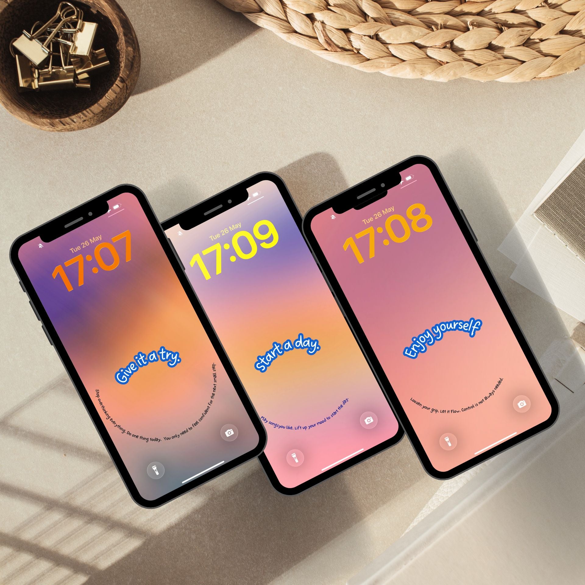 Three phones shown at an angle displaying gradient wallpaper designs, each with a short curved affirmation arching along the bottom of the screen.