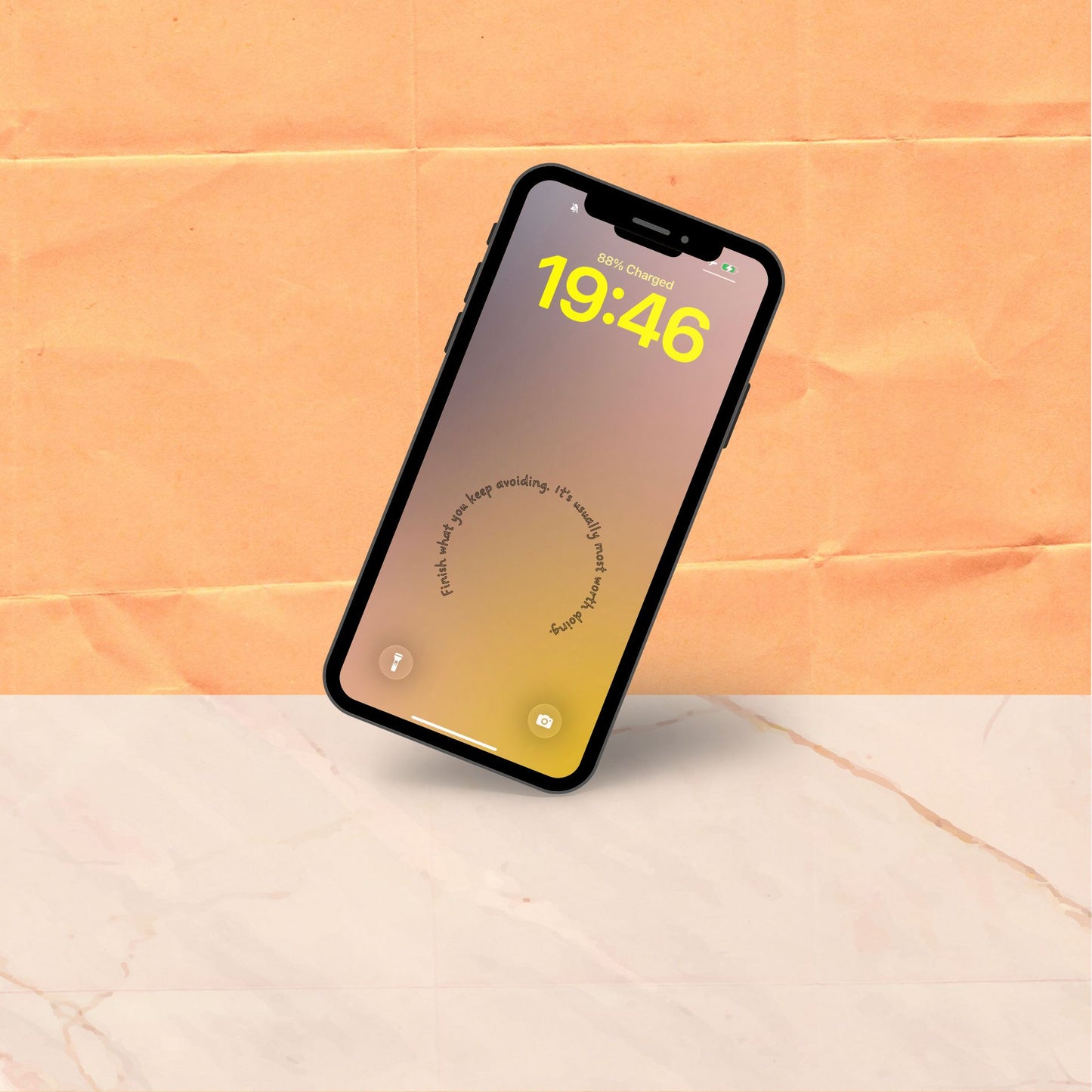 A single phone tilted at an angle showing a warm amber and golden gradient phone aesthetic wallpaper with a short affirmation curving at the centre.