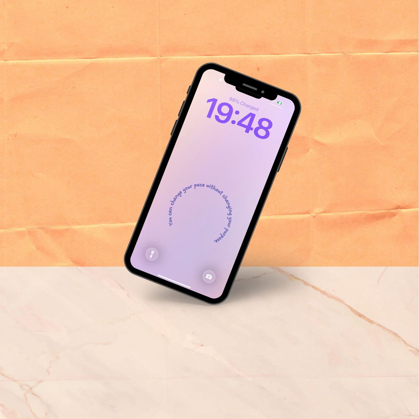 A single phone tilted at an angle showing a soft purple gradient lock screen wallpaper with a short affirmation curving in a gentle circle at the centre.