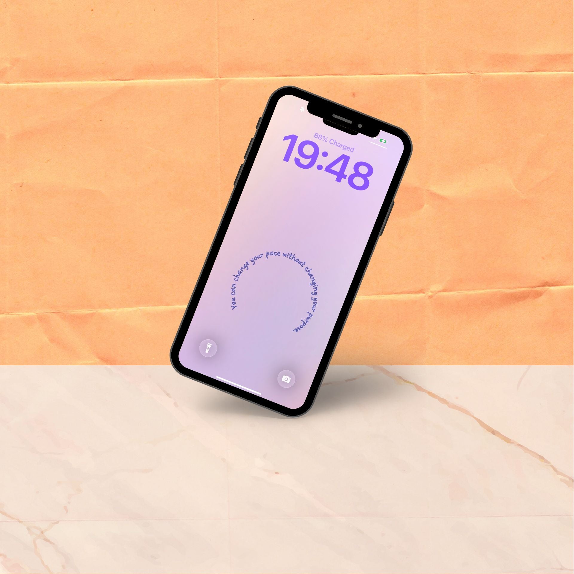 A single phone tilted at an angle showing a soft purple gradient lock screen wallpaper with a short affirmation curving in a gentle circle at the centre.