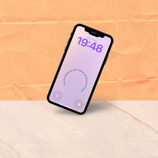 A single phone tilted at an angle showing a soft purple gradient lock screen wallpaper with a short affirmation curving in a gentle circle at the centre.